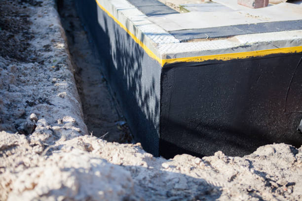 Professional Waterproofing technician working in Vance, AL